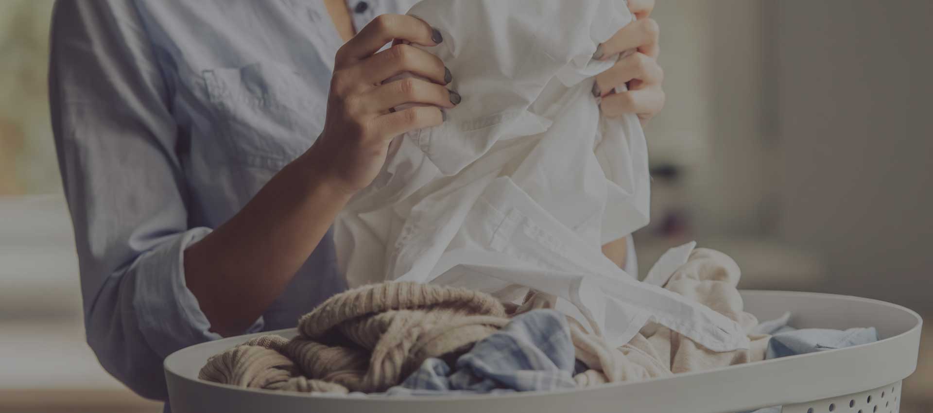 Woman holding a Sweater